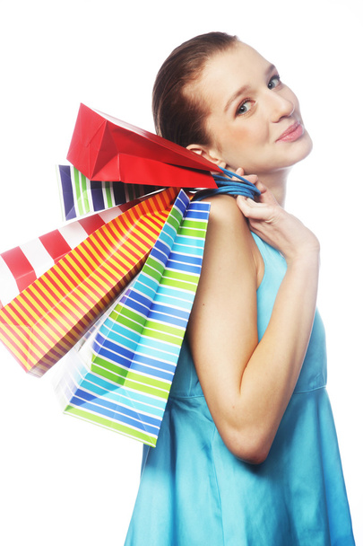 Young woman carrying shopping bags - Photo, image