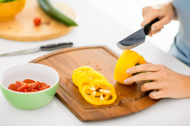 Woman hands cutting vegetables - Fotoğraf, Görsel