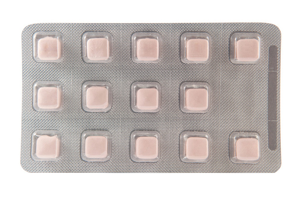 Tablette in quadratischer Form in transparenter Blisterverpackung - Foto, Bild