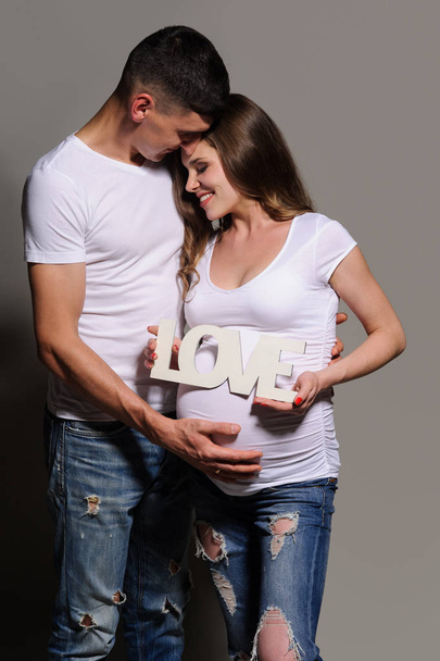 Beautiful young couple expecting baby - Photo, Image