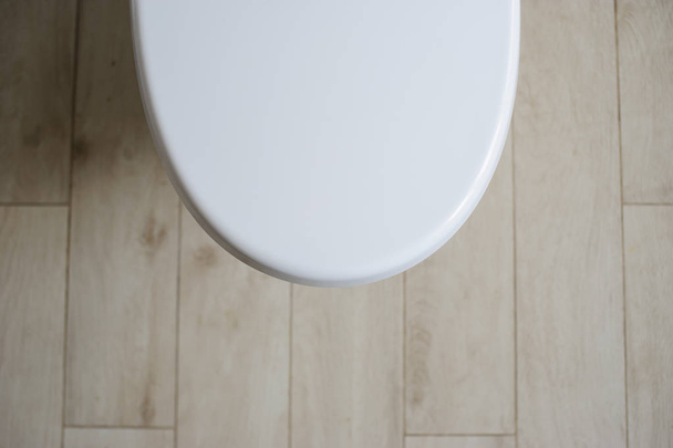 New ceramic toilet bowl at home - Фото, изображение