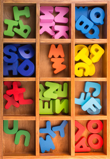 Fából készült színes betűk  - Fotó, kép