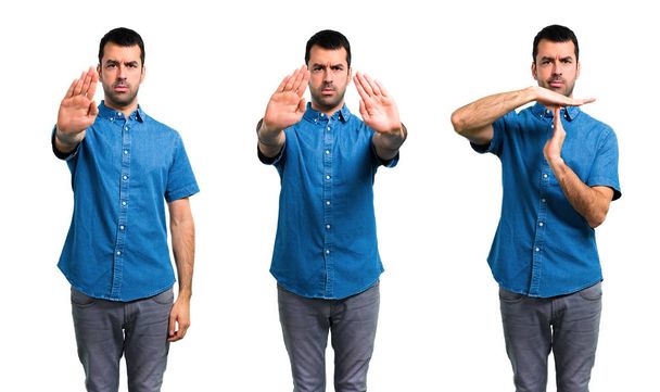 Zestaw przystojnego mężczyznę z niebieską koszulką, która czyni z niej gest zatrzymania - Zdjęcie, obraz