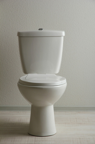 White toilet bowl in a bathroom - 写真・画像