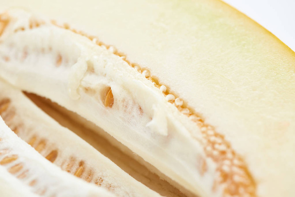 vista de perto de doce delicioso melão maduro com sementes
 - Foto, Imagem