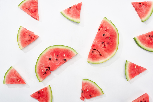 pattern with delicious juicy watermelon slices on white background - Fotó, kép