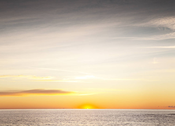 slunce přeletí přes moře - Fotografie, Obrázek