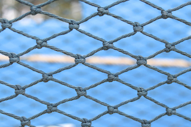 Nylon rope that weave into the net with blurred background. - Photo, Image