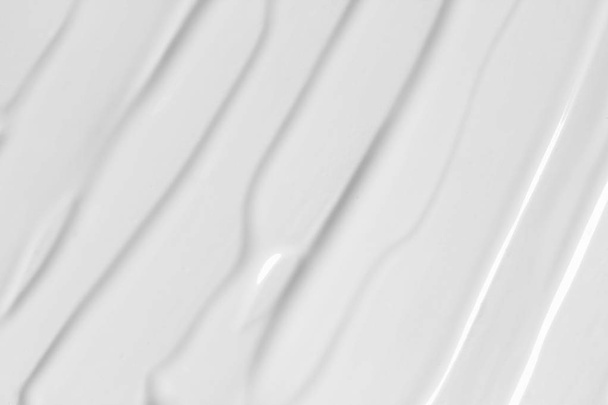 BB, CC κρέμα υφή. Λευκό φόντο βάλσαμο ομορφιάς. Καλλυντικό μουτζούρα κρέμας προσώπου - Φωτογραφία, εικόνα