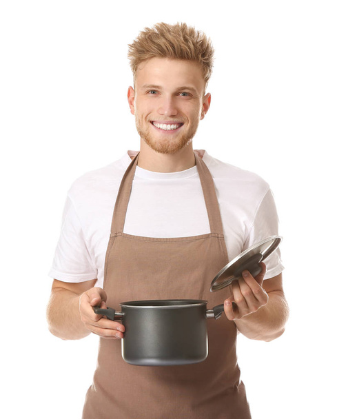 Chef masculino guapo con sopa sobre fondo blanco
 - Foto, Imagen