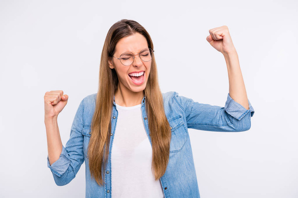 Close up photo of excited cheerful nice cool modern hipster raising fists up isolated grey background - Photo, Image