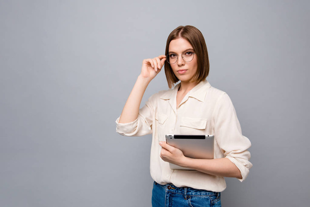 Close up side profile photo beautiful she her business lady chief e-reader hands arms reader classroom lesson lecture online webinar learn wear specs casual white shirt isolated grey background - Fotografie, Obrázek
