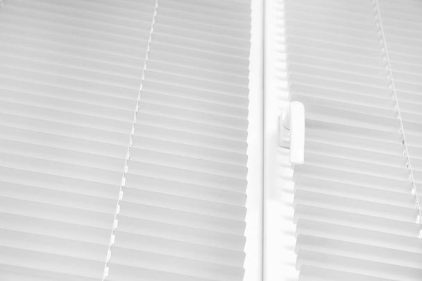Window with modern horizontal blinds indoors, closeup - Foto, Imagen