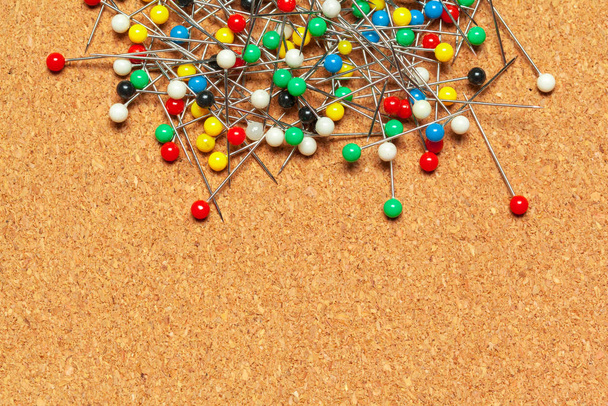 Group of thumbtacks  on corkboard close up. School or business concept - Foto, immagini