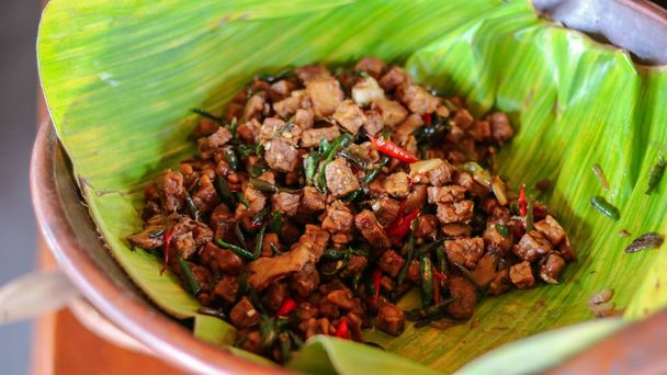παραδοσιακό ινδονησιακό φαγητό. ασιατικό μαγειρικό oseng tempe αναμεμειγμένο με μακριά φασόλια - Φωτογραφία, εικόνα
