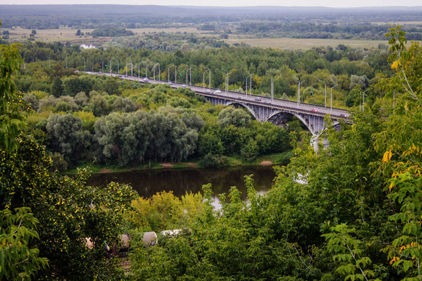 Panorama of the valley with a car bridge over the river Klyazma summer day in Vladimir Russia - Fotoğraf, Görsel