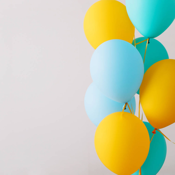 Colorful balloons. Festive or party background. Birthday greeting card. Concept of happiness, joy, birthday. Copy Space  - 写真・画像