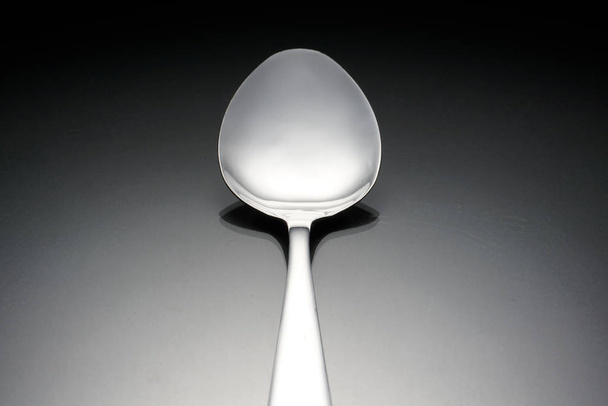 silver spoon on surface,  - Fotografie, Obrázek