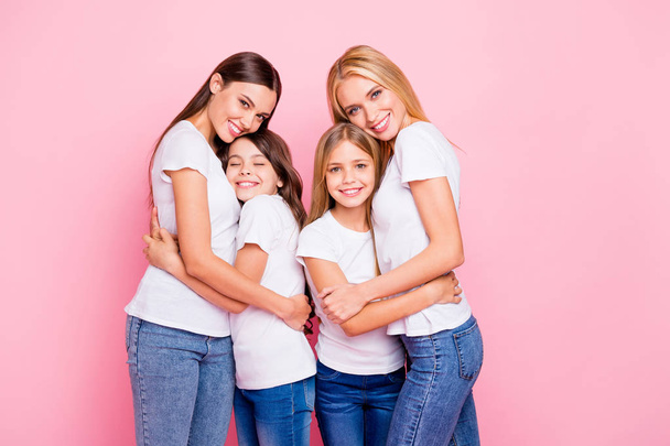 Photo of four ladies spending time together wear casual outfit isolated pink background - Photo, image