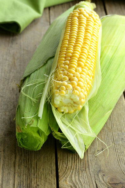 Fresh organic corn on the wooden table - Fotografie, Obrázek