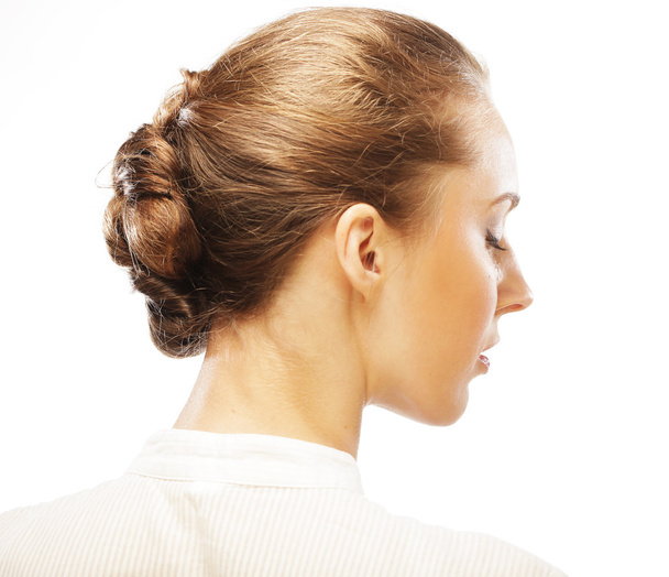 Visage féminin de profil avec maquillage et coiffure
 - Photo, image