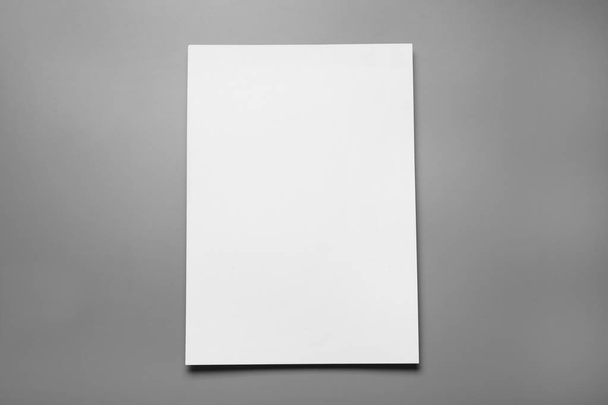 Blank paper sheets for brochure on grey background, top view. Mock up - Фото, зображення
