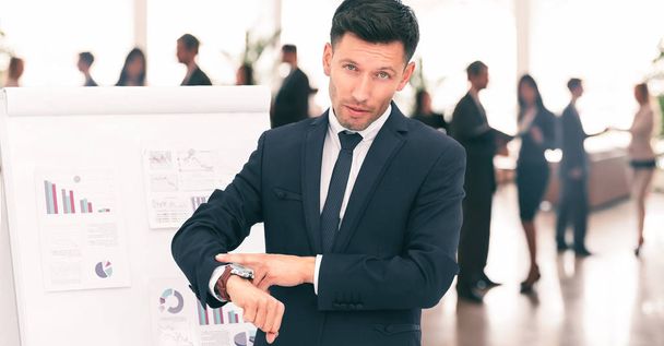 concept is to protect your time. businessman points  his watch - Fotografie, Obrázek