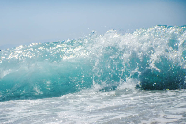 Breaking Wave of Blue Ocean on sandy beach Summer Background - 写真・画像