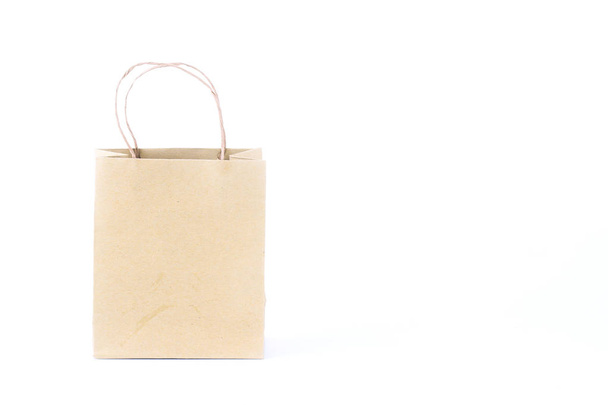 carton shopping paper bag isolated on white  - Фото, изображение