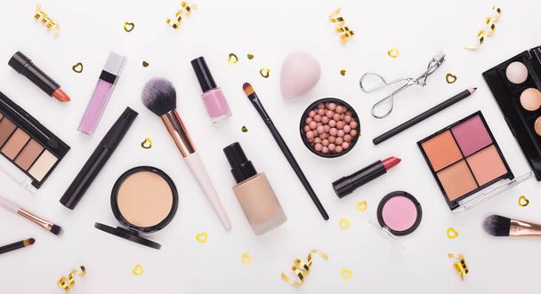 Flat lay of beauty accessories and decorative cosmetics on white - Photo, Image