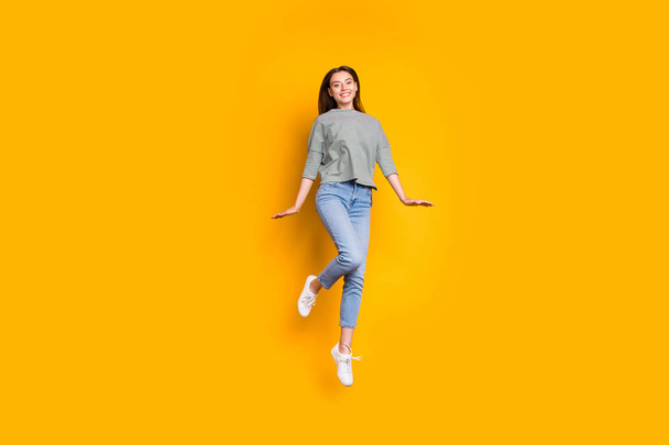Full length body size photo of nice kind girlfriend feeling like child while isolated with yellow background - Фото, зображення