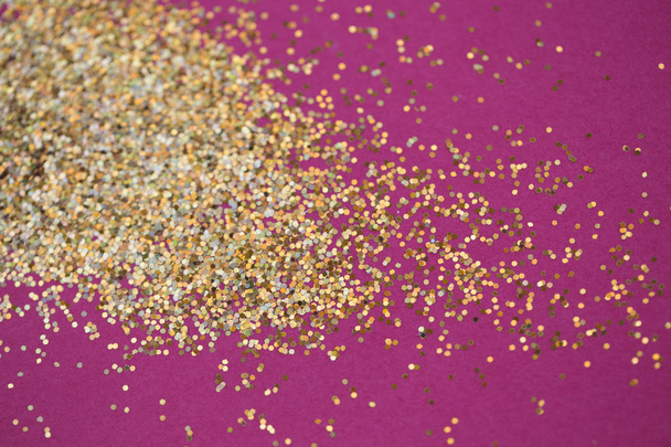  gold glitter texture.gold glitter auf rosa Hintergrund. - Foto, Bild