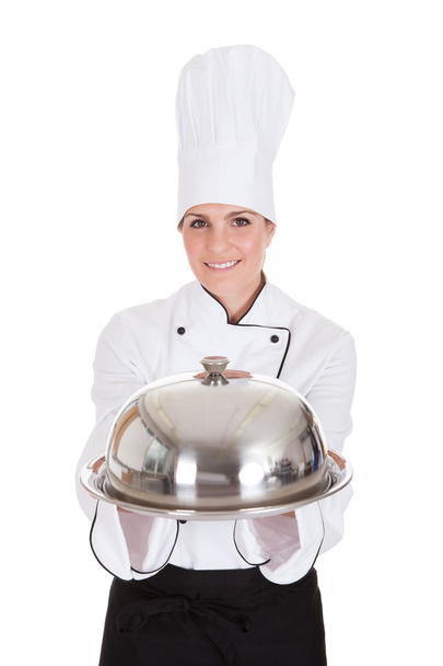 Portrait Of Female Chef Holding Tray - Photo, image