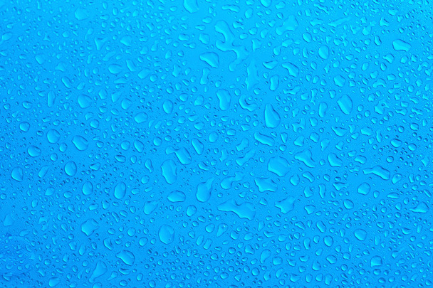 Water Drops On Blue Background, Texture colorful waterdrop. - Photo, Image