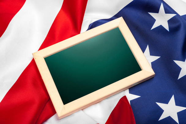 Blank frame on American flag background - Фото, зображення