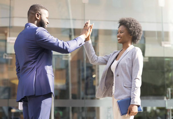 Good job partner. Businessman giving high five to his collegue - Photo, Image