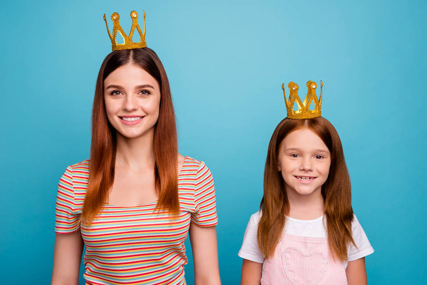 Confident foxy little lady and mommy magic headwear dressed in casual outfit isolated blue background - Φωτογραφία, εικόνα