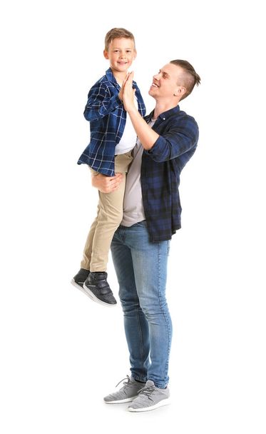 Portrait of happy father and son on white background - Foto, Imagem