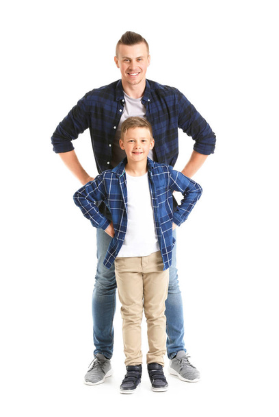 Portrait of happy father and son on white background - Photo, Image