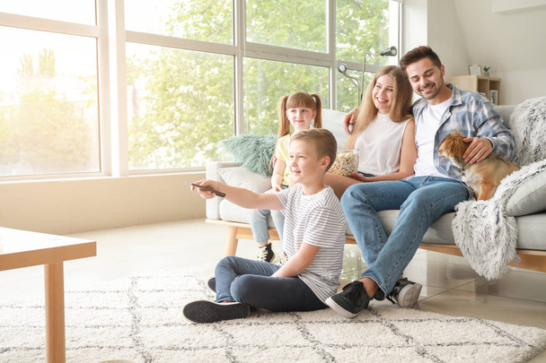 Happy family watching TV at home - Φωτογραφία, εικόνα