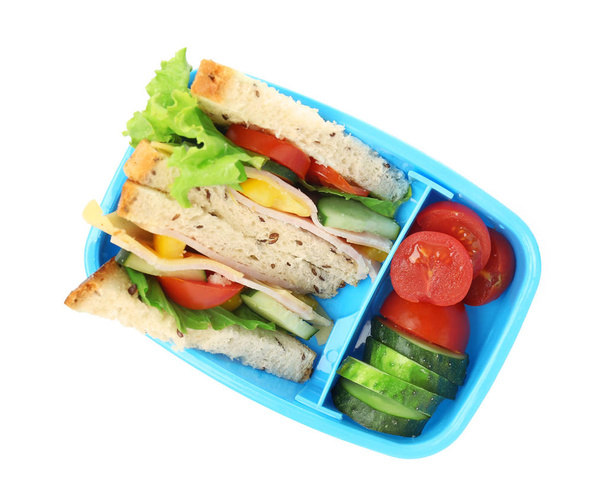 Almuerzo escolar con sabrosa comida sobre fondo blanco
 - Foto, imagen