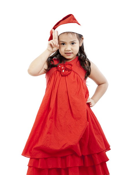 Portrait of happy little girl in Santa dress - Фото, изображение