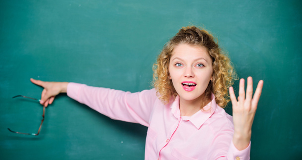 Informing kids. School rules. School principal stressful outraged expression. Educational system concept. School lesson knowledge. Remember this. Strict woman teacher pointing at chalkboard - Photo, Image