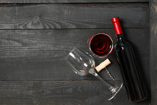 Flat lay composition with bottle of wine, glasses and corkscrew  - Foto, Imagem
