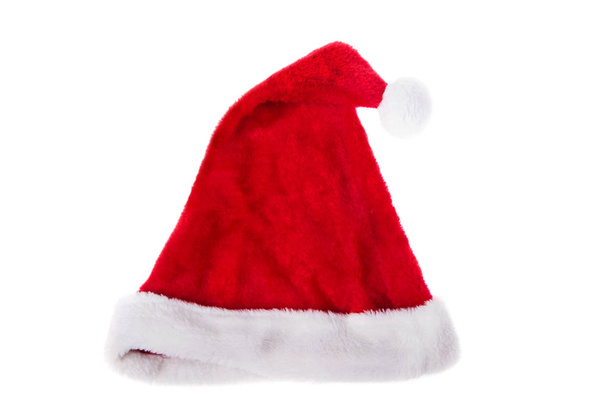 Červený klobouk Santa Clause izolovaný na bílém pozadí. Veselé Vánoce, šťastný nový rok. - Fotografie, Obrázek