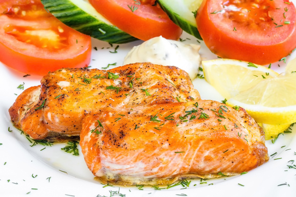 grilled salmon with lemon, white plate, top view - Photo, Image