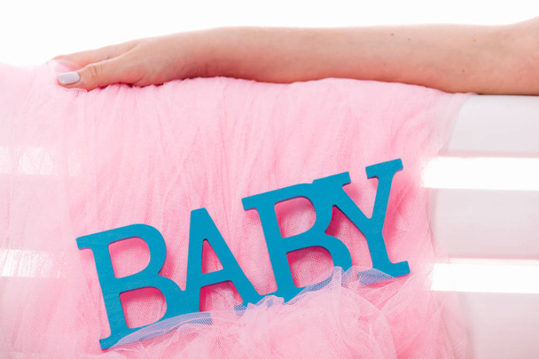 Close-up de rótulo azul Bebê para recém-nascido, em rosa. Cartas azuis
 - Foto, Imagem