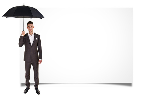 Чоловік тримає парасольку і порожню дошку
 - Фото, зображення