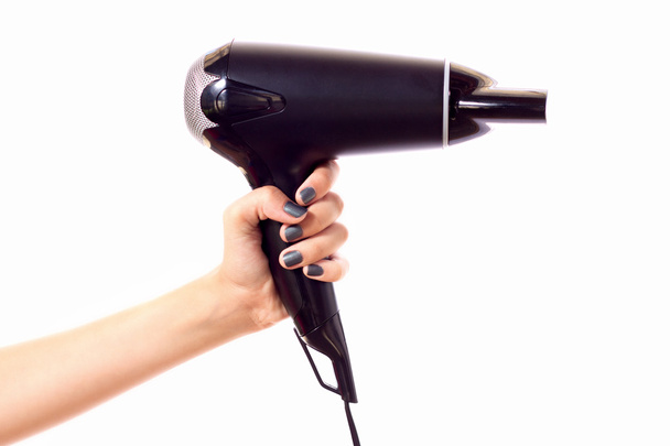 Black hair dryer on a white background - Fotó, kép