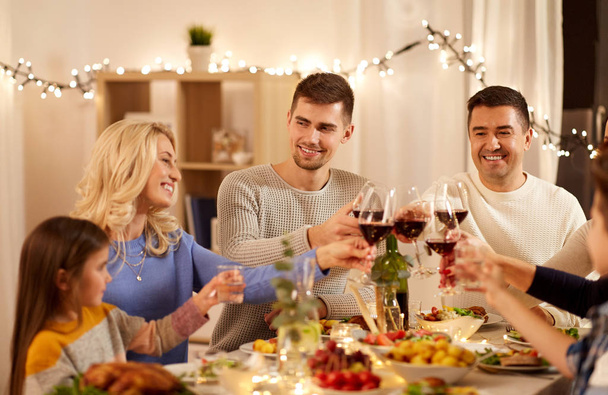 happy family having dinner party at home - 写真・画像